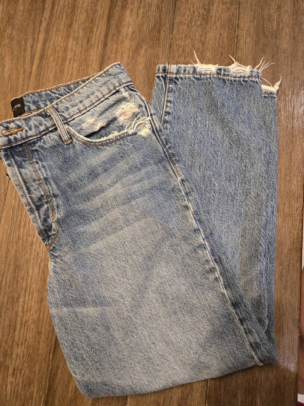 Women's Light Blue Distressed Jeans
